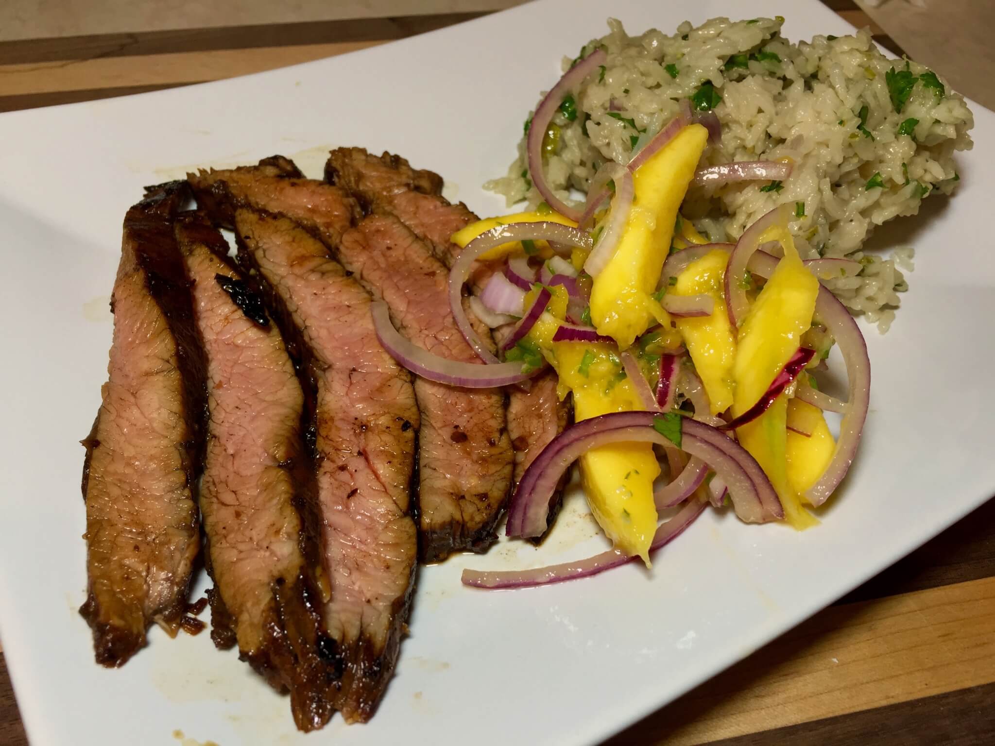 Seared Serrano Steak with Sweet Mango Slaw & Cilantro Rice