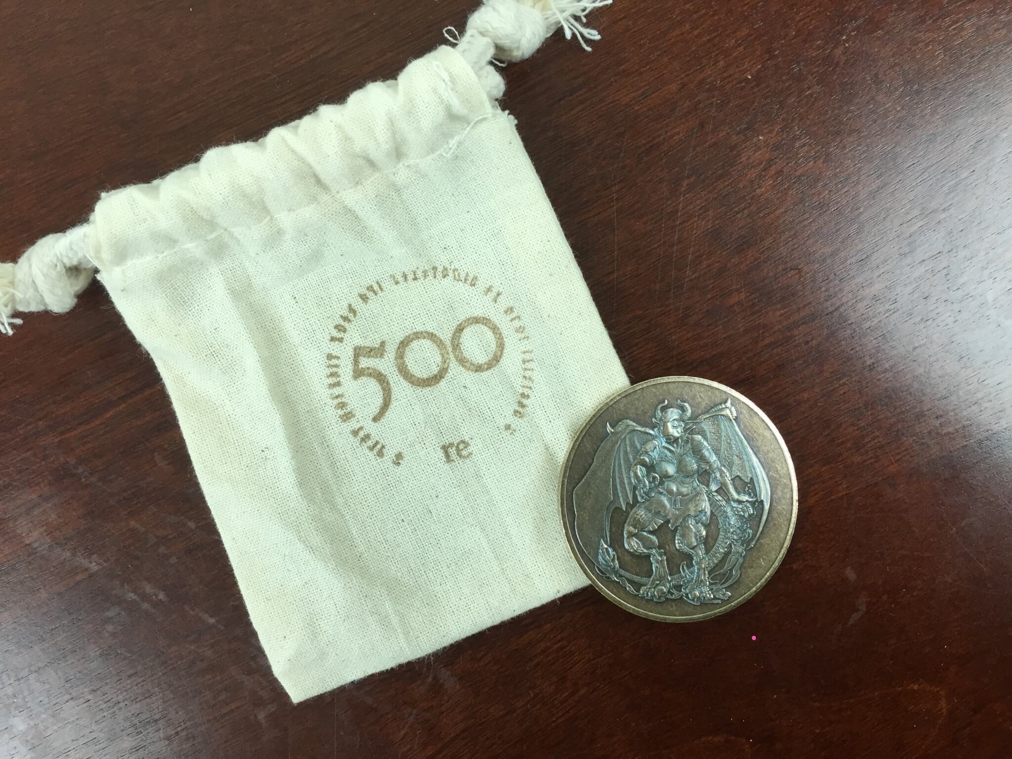 geek me box july 2015 coin